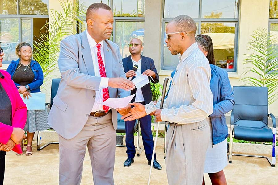 Kuphanga handing over promotion letters